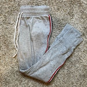 Gray joggers with red white and blue stripe
